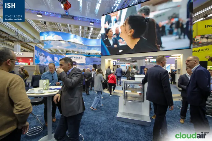 Coffee tables and LED wall on the TROX stand at ISH 2025
