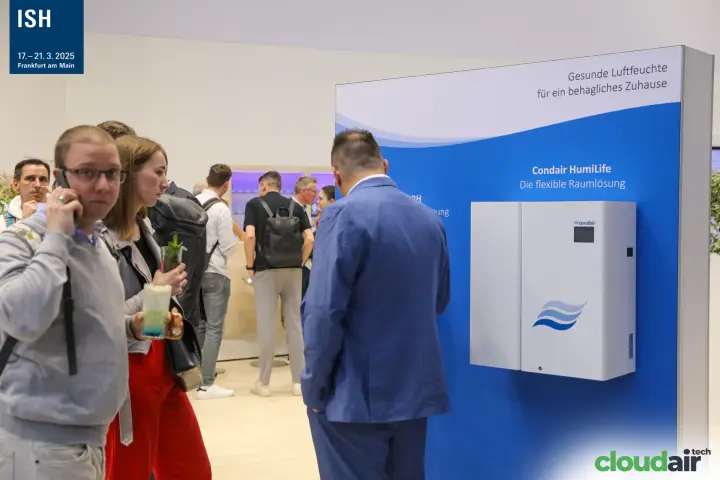 Condair HumiLife room humidifier on a blue display wall at ISH 2025