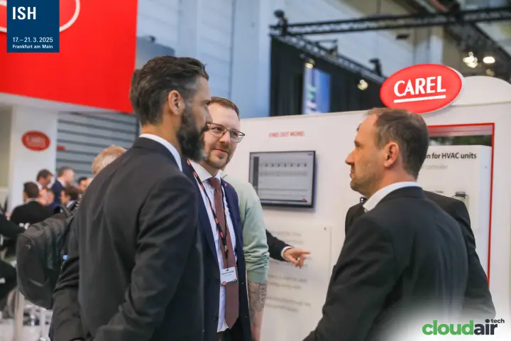 Conversation in front of the Carel controls display for HVAC units at ISH 2025