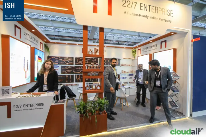 Copper fittings shelf and team at the 22/7 Enterprise booth
