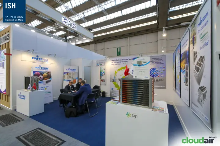 Copper heat recovery coil on a plinth at the Friterm stand at ISH 2025