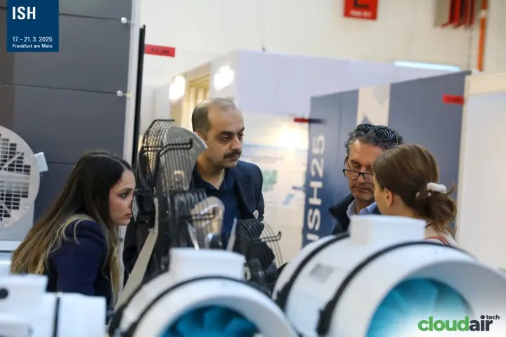 Discussion over guarded axial fans at the Kayi display at ISH 2025