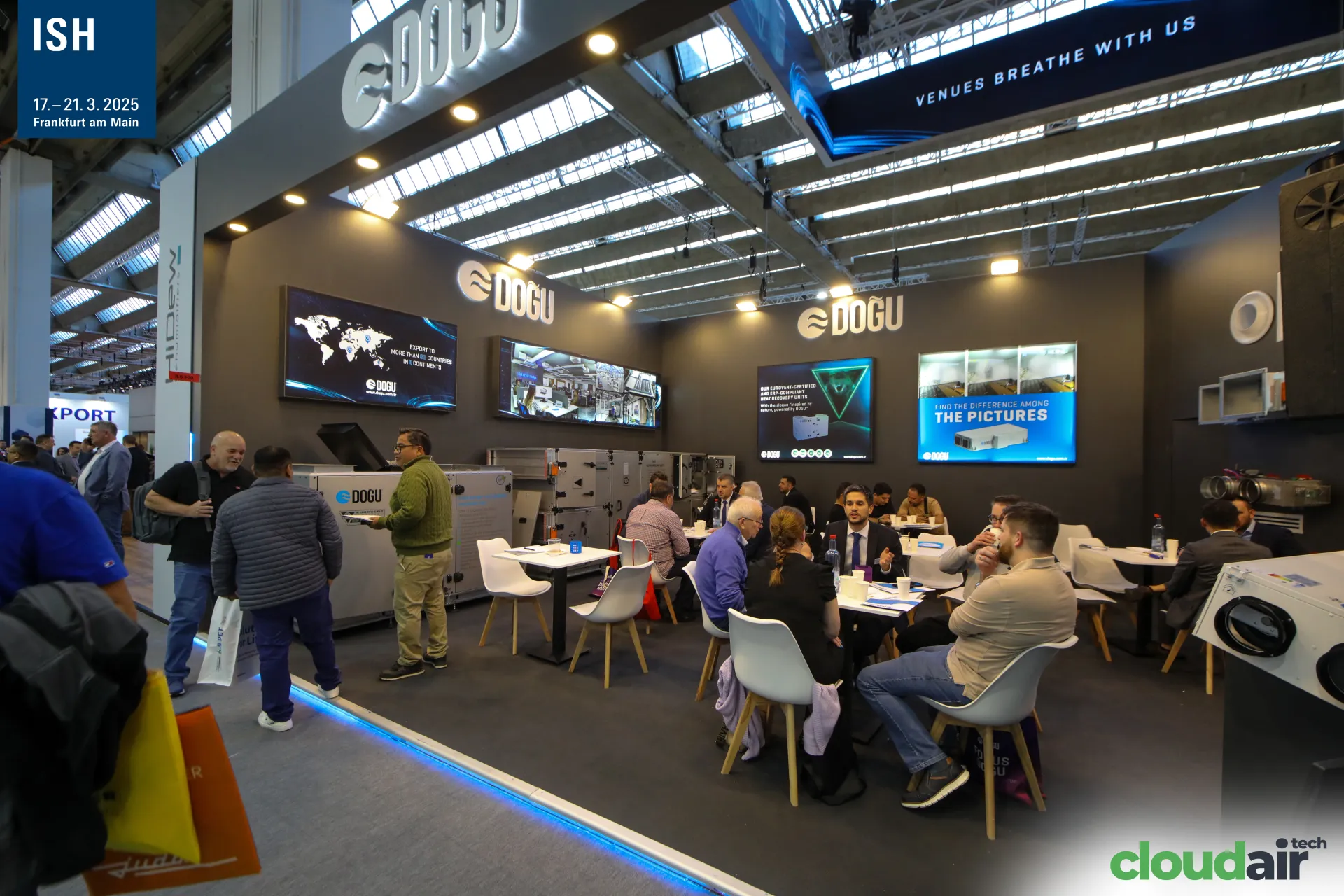 Doğu meeting area with screens and air handling units along the wall at ISH 2025