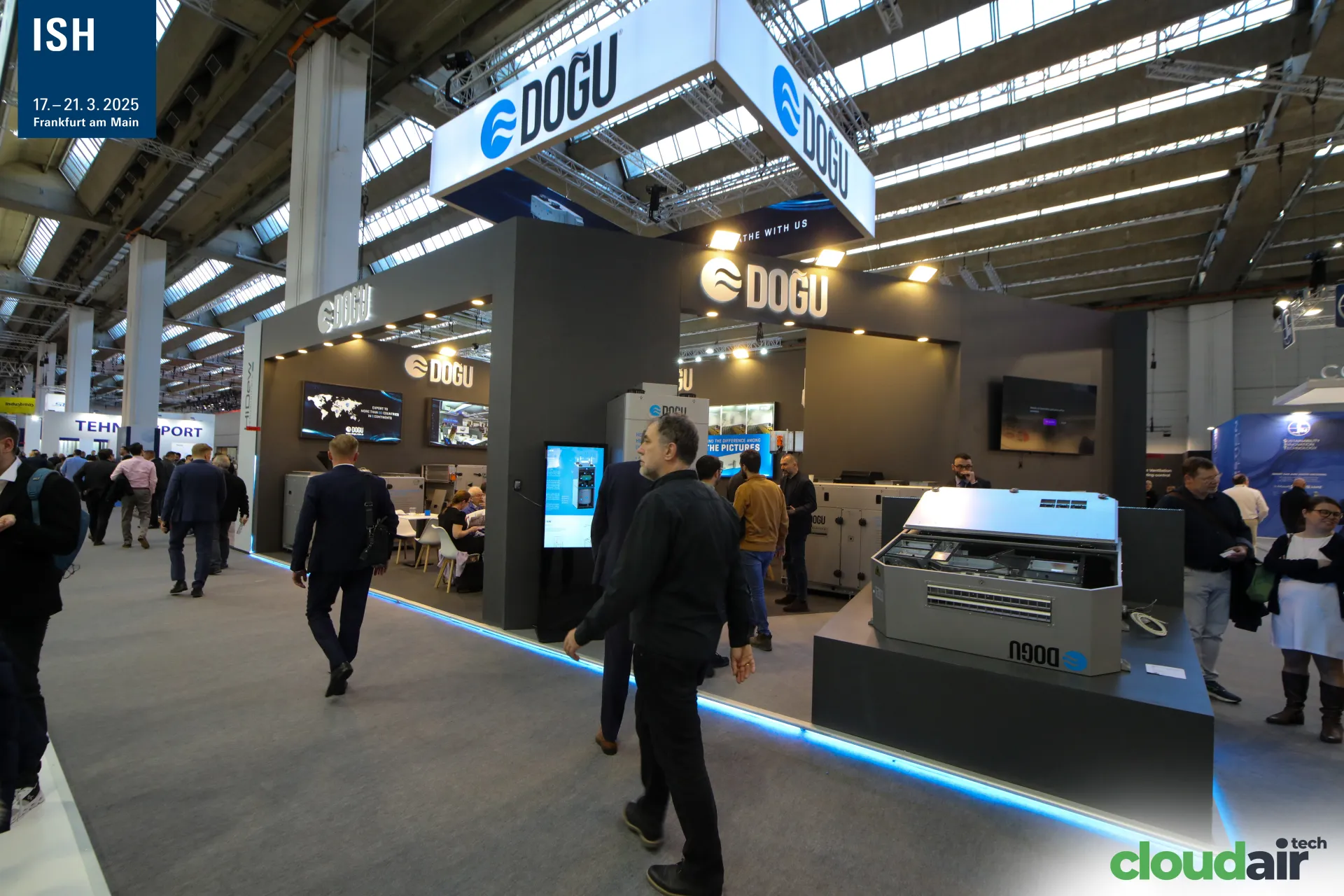 Doğu stand seen from the aisle with suspended logo box at ISH 2025