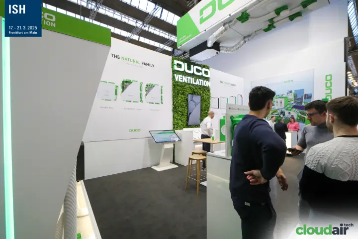 Duco Natural Family wall with DucoBox units and a touchscreen kiosk