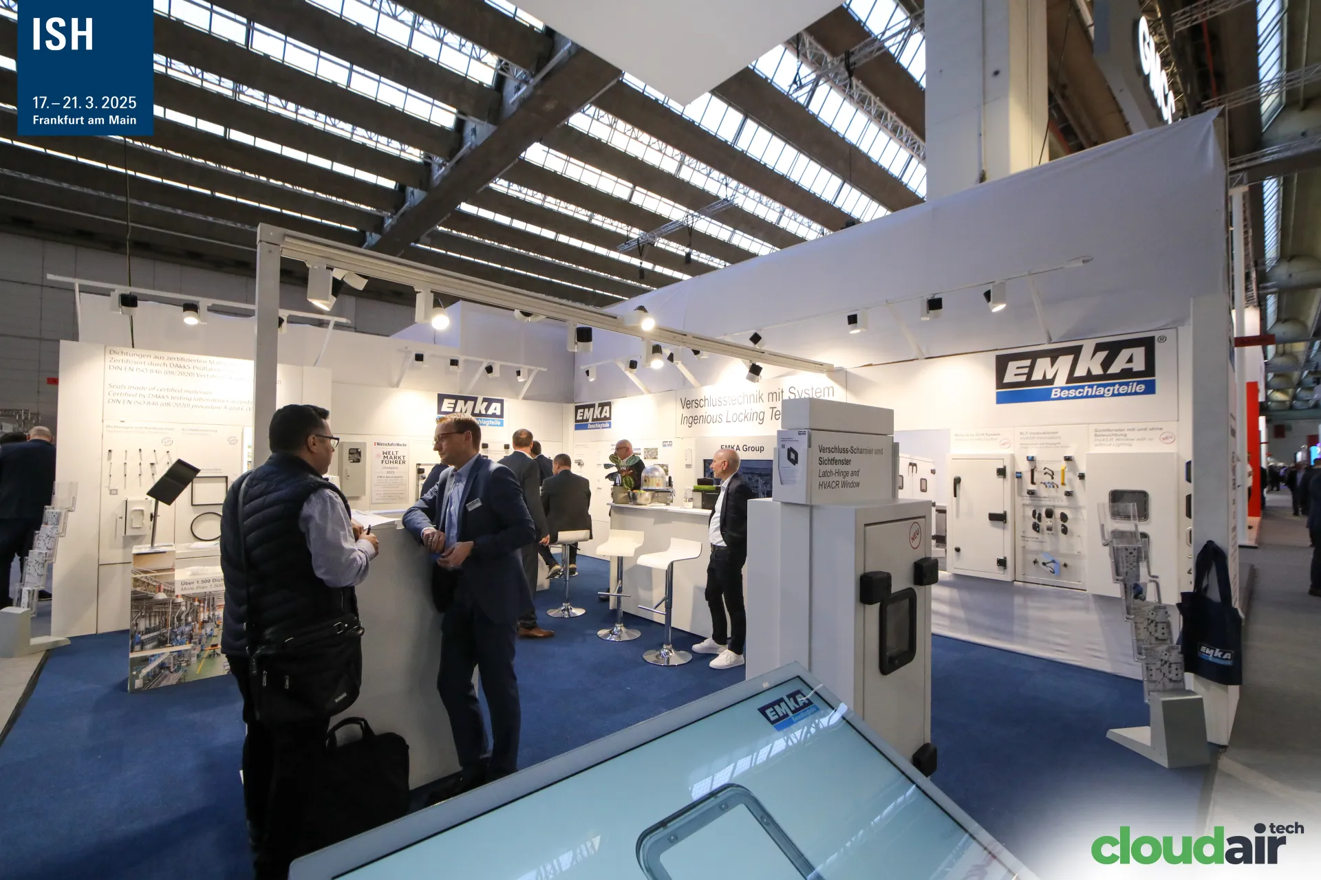 EMKA Beschlagteile stand with latch-hinge and HVACR window display at ISH 2025