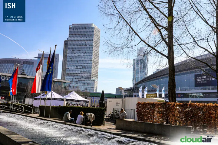 Fairground square with catering tents and Geberit hall banner