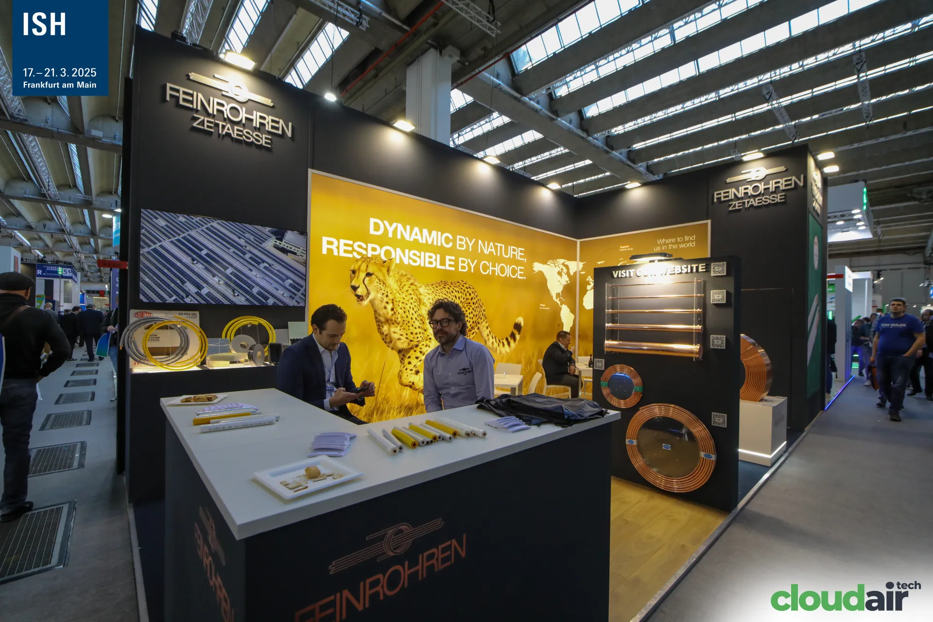Feinrohren stand with copper tube coils and cheetah backdrop at ISH 2025