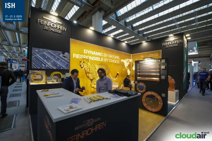 Feinrohren stand with copper tube coils and cheetah backdrop at ISH 2025