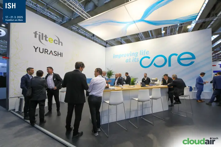 Filtech and Yurashi stand with long meeting counter under a suspended canopy at ISH 2025
