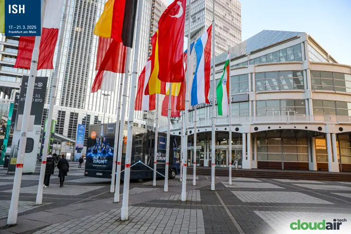 Flags and a Buderus truck outside the Messe Frankfurt City entrance at ISH 2025