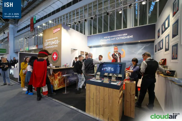 Full view of the Lucoma stand with mascot, bar and product kiosk at ISH 2025