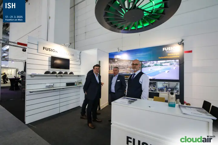 Fusion Modulair stand under a large green-lit swirl diffuser