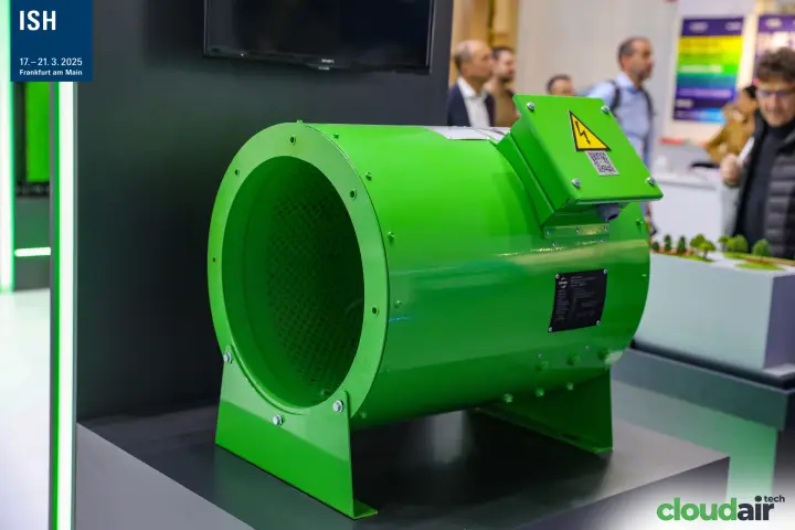 Green cylindrical duct unit with terminal box on a dark plinth