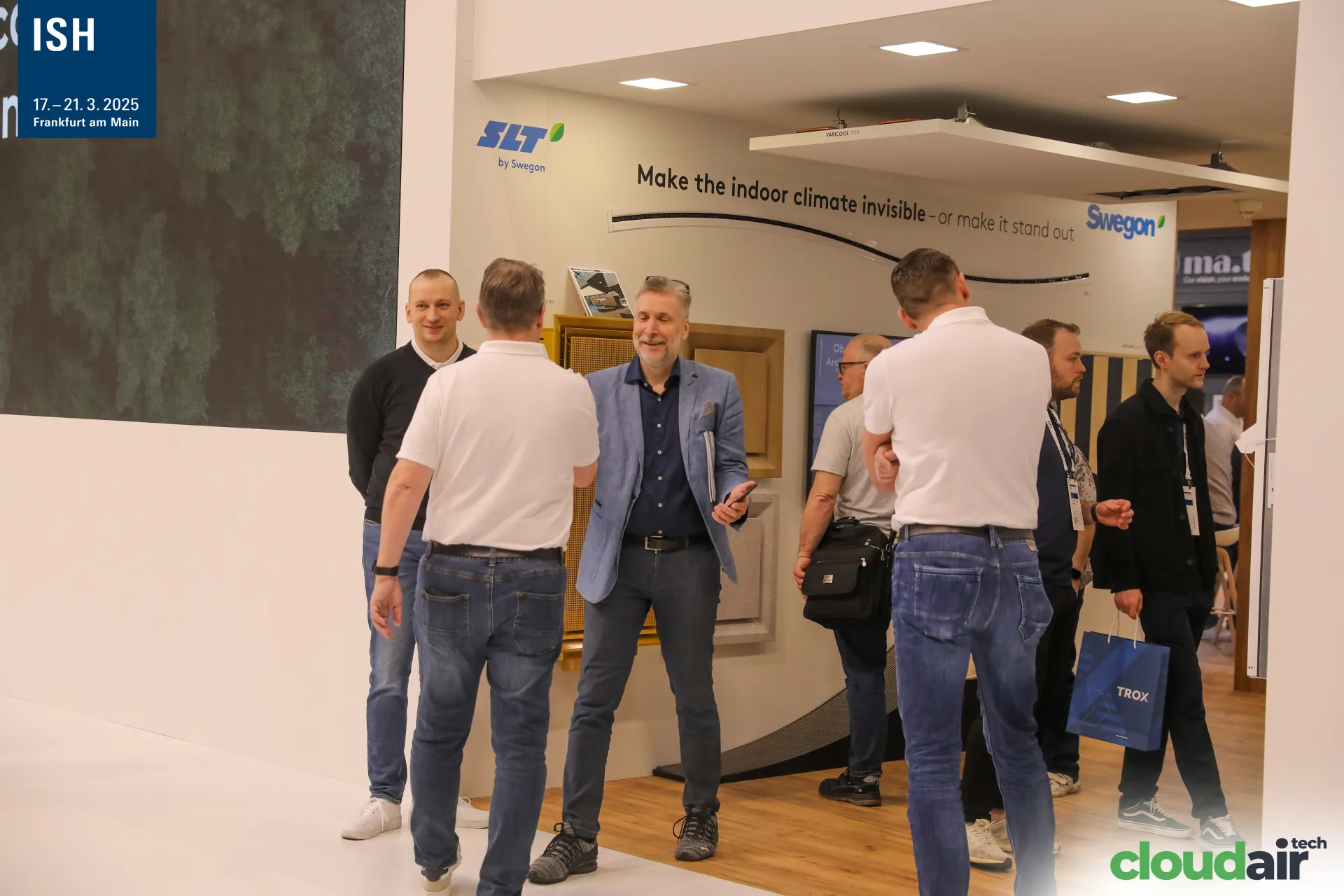 Greeting at the SLT by Swegon wall of design climate panels at ISH 2025