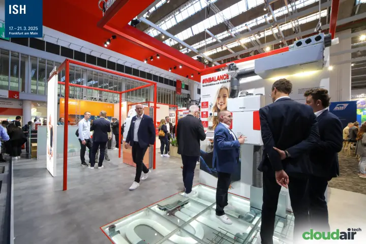 Helios KWL heat recovery unit above a glass floor of duct runs at ISH 2025