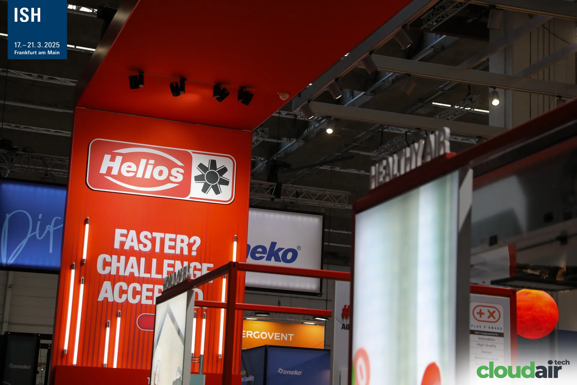 Helios red tower with "FASTER? CHALLENGE ACCEPTED" slogan at ISH 2025