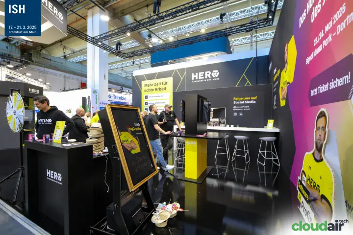 HERO Handwerker Software stand with coffee bar and HEROcon wall