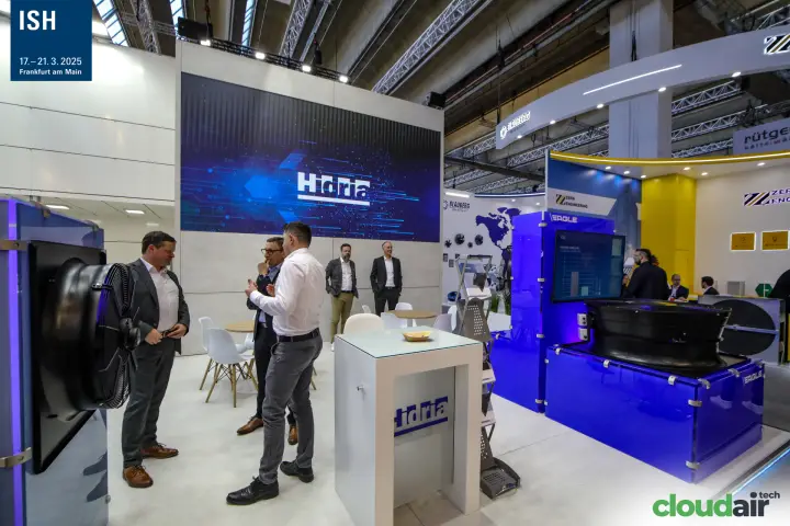 Hidria logo on video wall above the stand's meeting area