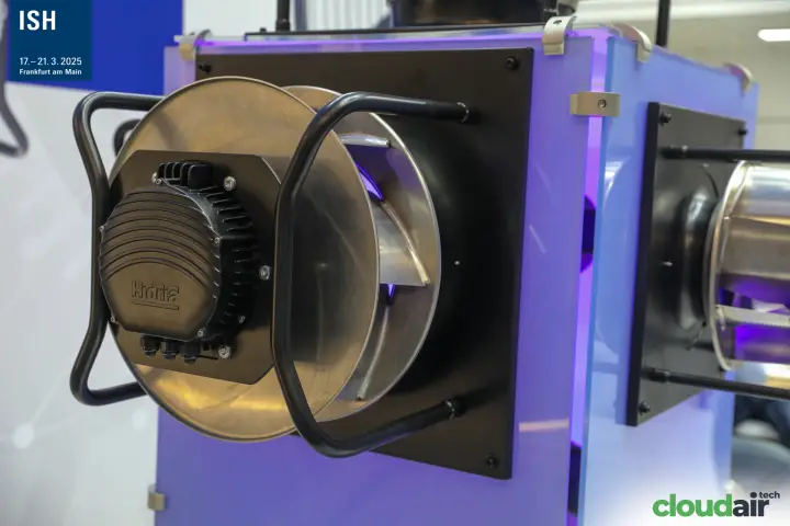 Hidria plug fan with ribbed motor housing on a purple-lit display at ISH 2025