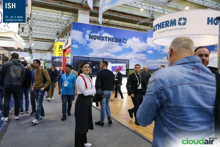 Howatherm stand with sky backdrop and circular hanging banner