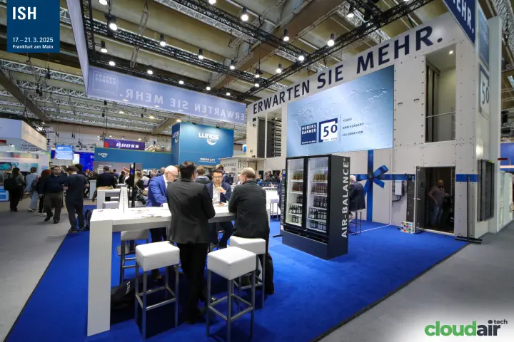 Huber & Ranner meeting tables beside the Air-Balance drinks fridge