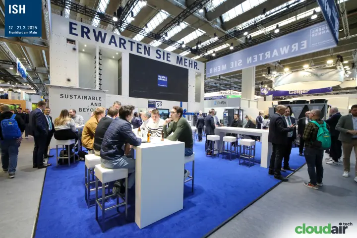 Huber & Ranner stand with "ERWARTEN SIE MEHR." lettering and busy bar tables at ISH 2025