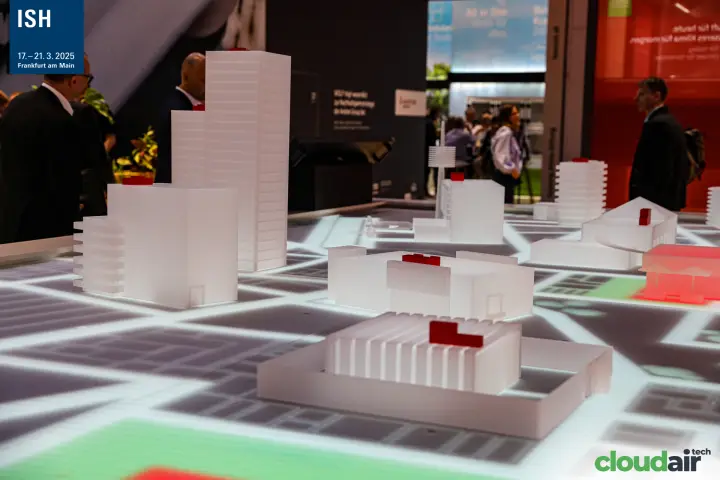 Illuminated city scale model with red rooftop units at Wolf at ISH 2025