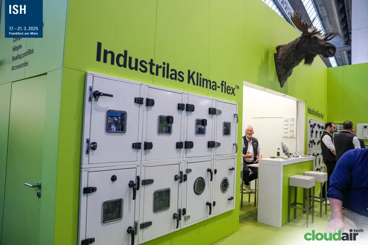 Industrilas Klima-flex door hardware on a lime green wall at ISH 2025