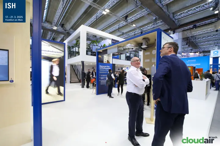 Inside the Systemair stand with pressurisation systems panel and two-storey office at ISH 2025