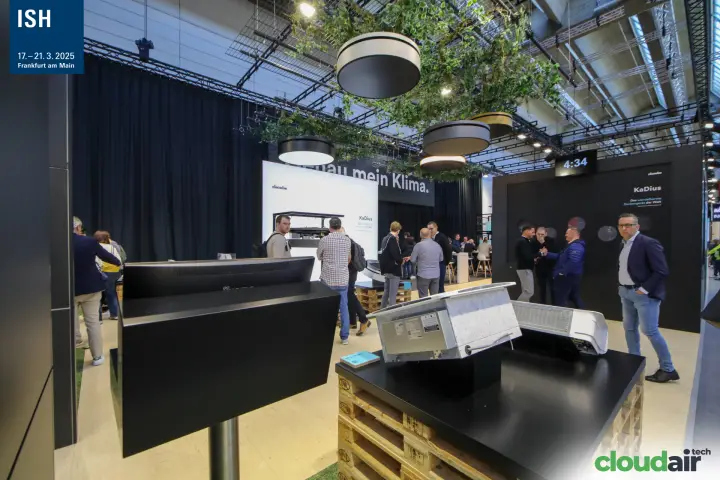 Kampmann stand under suspended foliage with KaDius units on pallets at ISH 2025