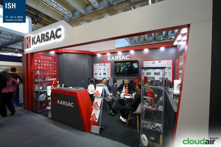 Karsac stand front with backlit logo and export country flag wall at ISH 2025
