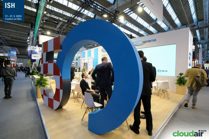 Klimaoprema meeting area seen through the blue zero of the 50 sculpture at ISH 2025