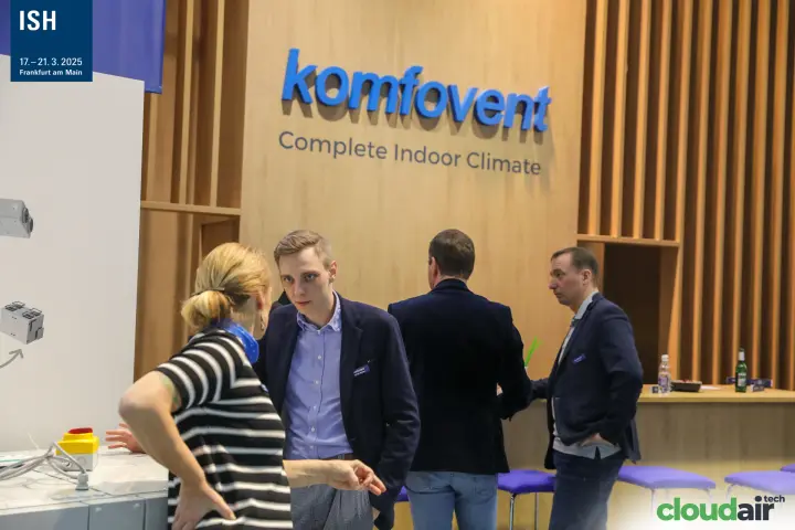 Komfovent "Complete Indoor Climate" logo wall with wooden slats