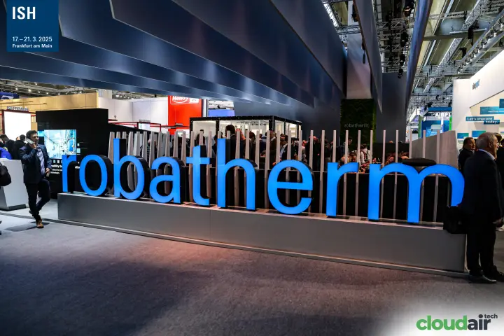 Large illuminated robatherm letters in front of a crowded stand at ISH 2025