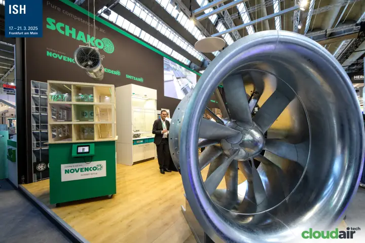 Large Novenco axial fan in front of the Schako Group stand at ISH 2025