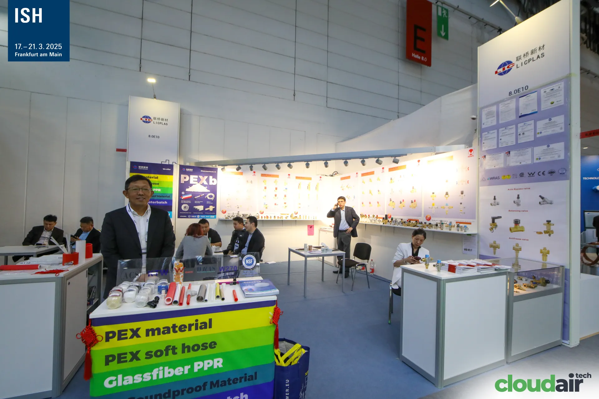 Licplas counter with PEX and PPR samples and a wall of brass fittings at ISH 2025