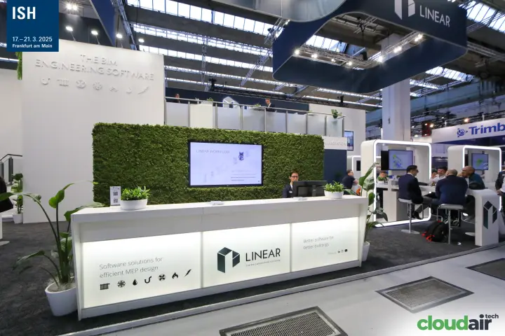 Linear reception counter in front of a moss wall with "LINEAR WORKFLOW" screen at ISH 2025