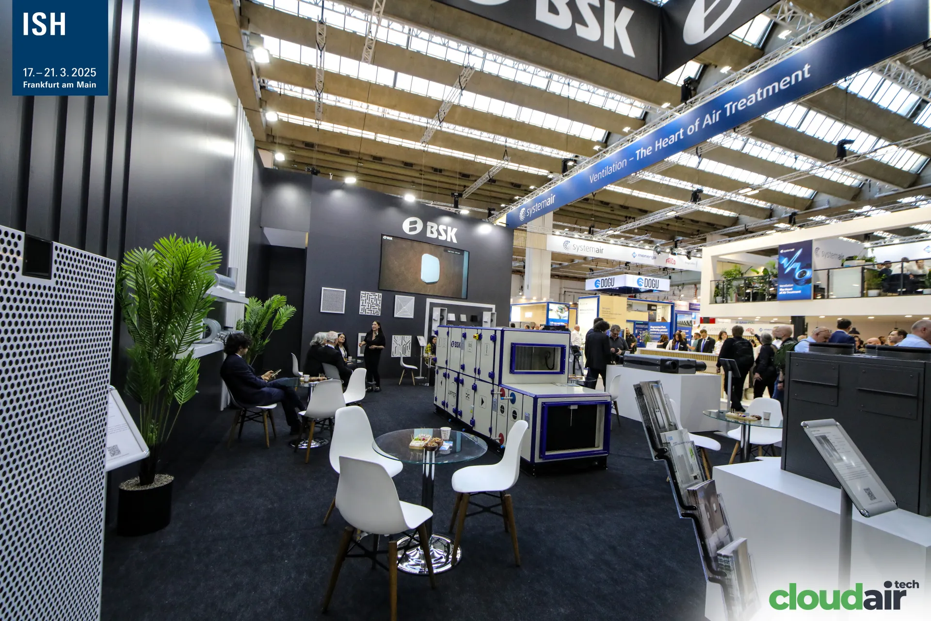 Lounge seating and white-and-blue air handling unit inside the BSK stand at ISH 2025
