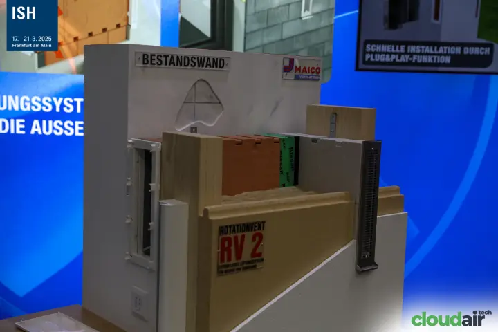 Maico wall cutaway showing the Rotationvent RV 2 installed in an existing wall at ISH 2025