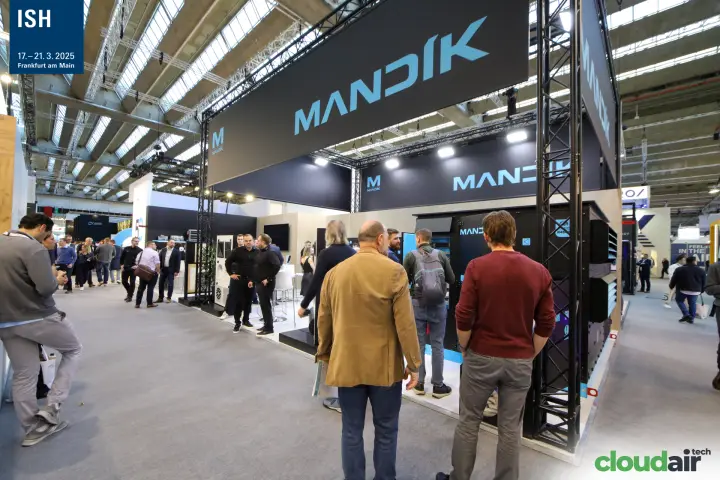 Mandík stand seen from the aisle, with black truss and branded fascia at ISH 2025