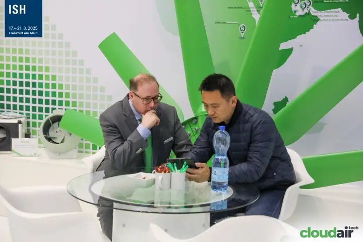 Meeting at a glass table on the Wolter fan stand at ISH 2025