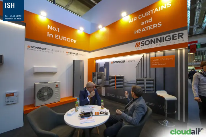 Meeting at Sonniger stand in front of Multisplit MX and heaters at ISH 2025