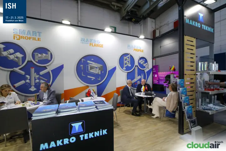 Meetings at the Makro Teknik stand beside its flange and profile wall at ISH 2025