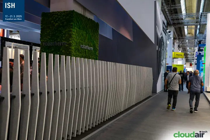 Moss-covered cube with robatherm lettering above a felt fin wall at ISH 2025