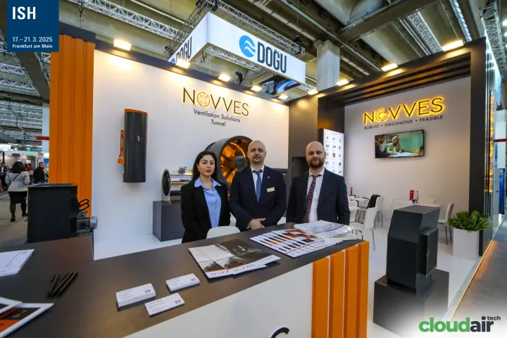 Novves team at the counter in front of the tunnel fan display at ISH 2025