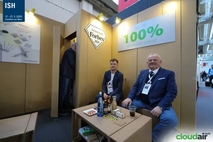 Nowa Gruppe cardboard lounge with Forbes Diamond Award 2024 sign