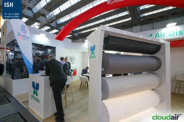 Perforated textile ducts in a Prihoda display frame with AirQuell flag at ISH 2025