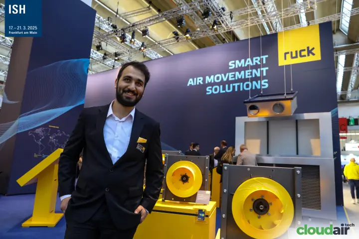 Portrait at the Ruck stand with suspended unit and plug fans at ISH 2025