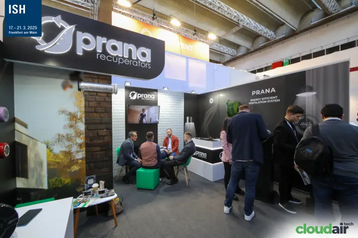 Prana recuperators stand with meeting corner and busy counter at ISH 2025